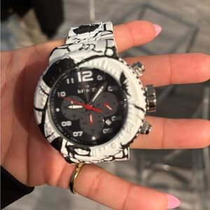 Invicta Black and White Watch with Red Accents